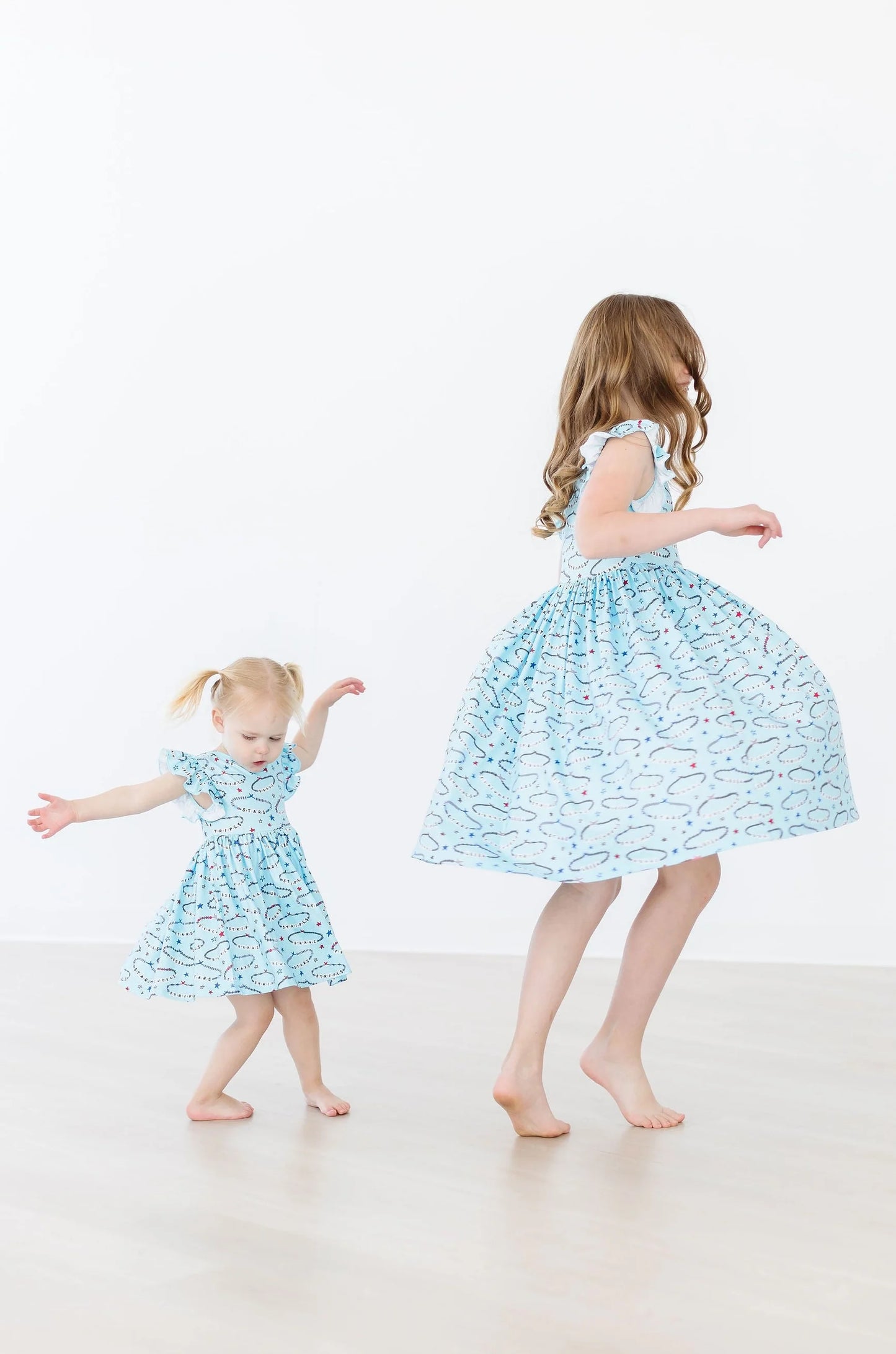 Miss Americana (Mila’s Version) Flutter Sleeve Twirl Dress by Mila & Rose