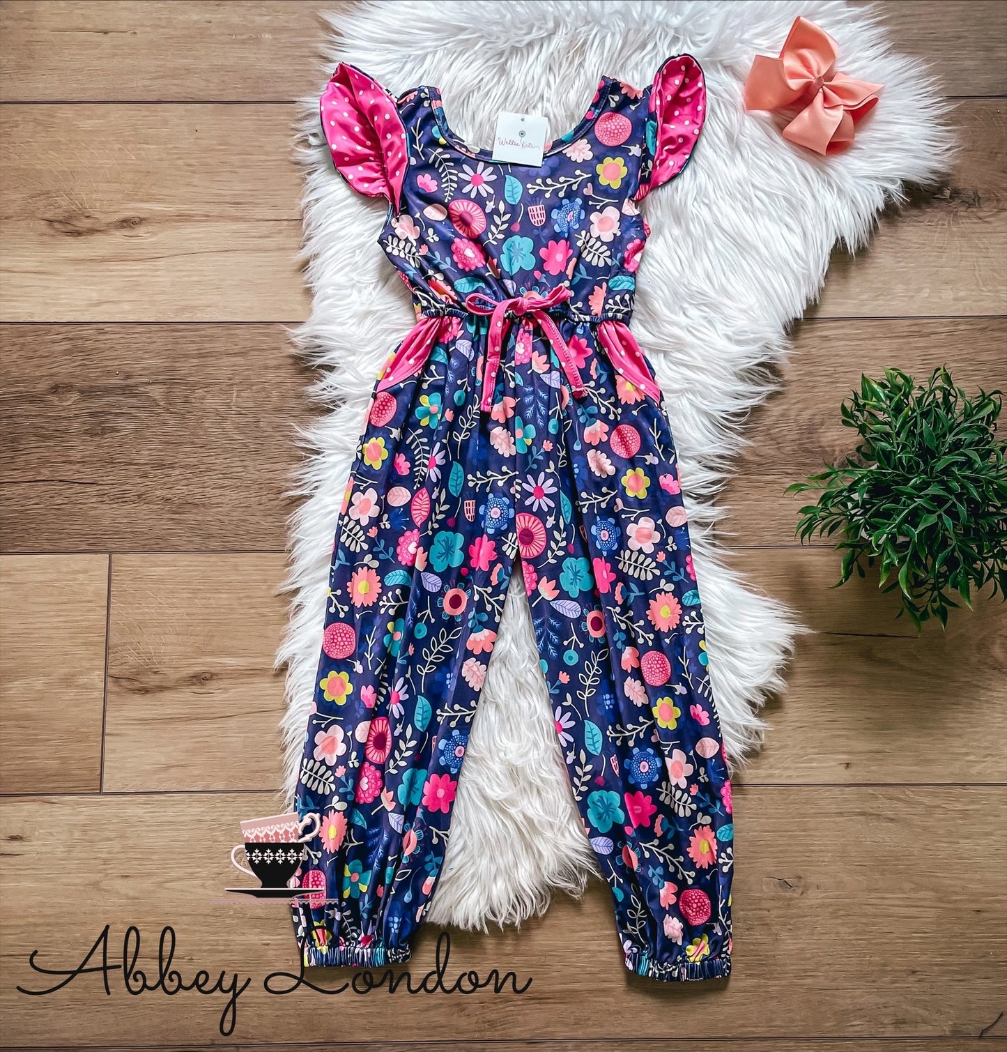 Bright Spring Floral Scoop Back Jumpsuit by Wellie Kate