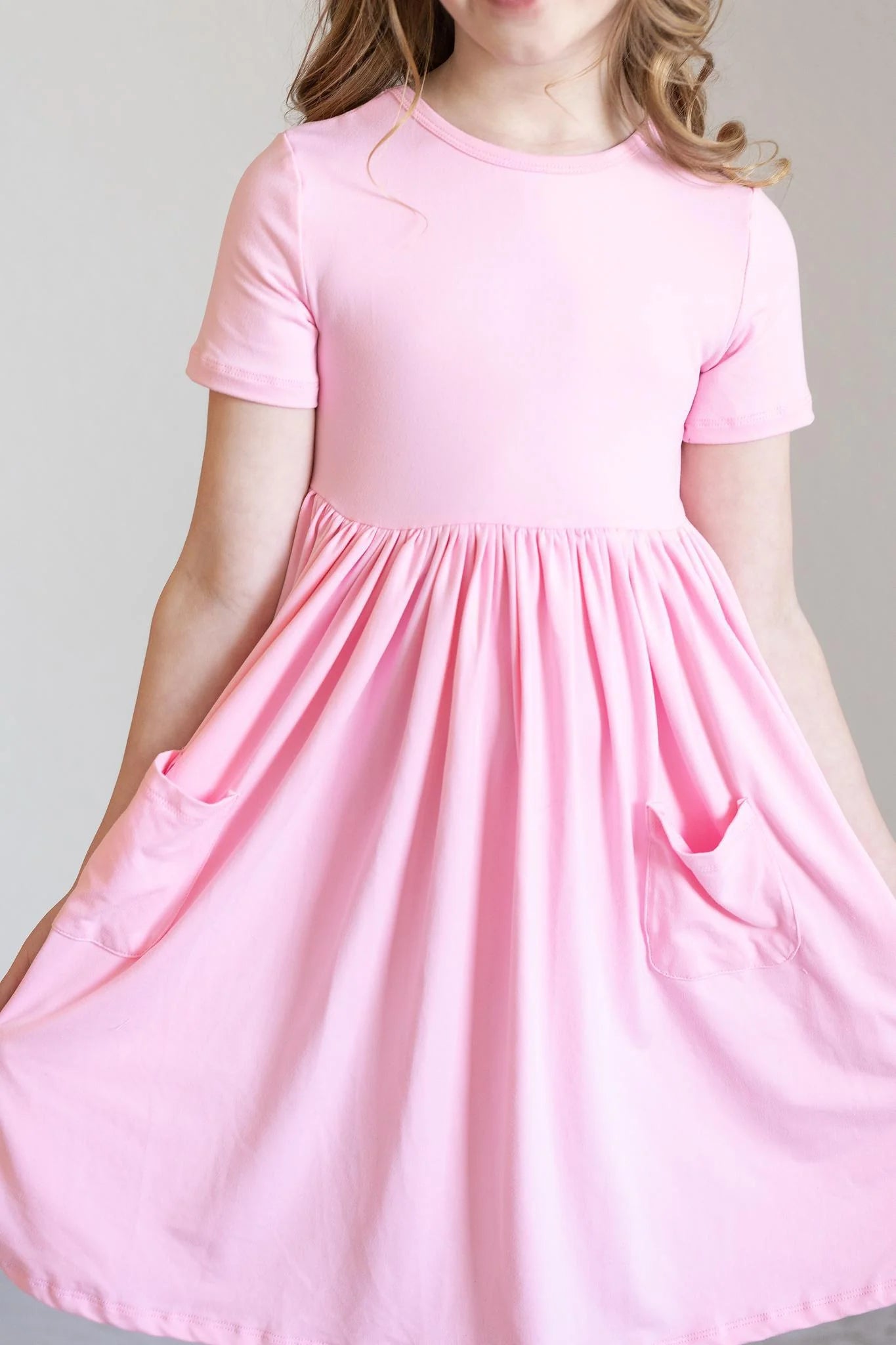 Bubblegum Pink Pocket Twirl Dress by Mila & Rose