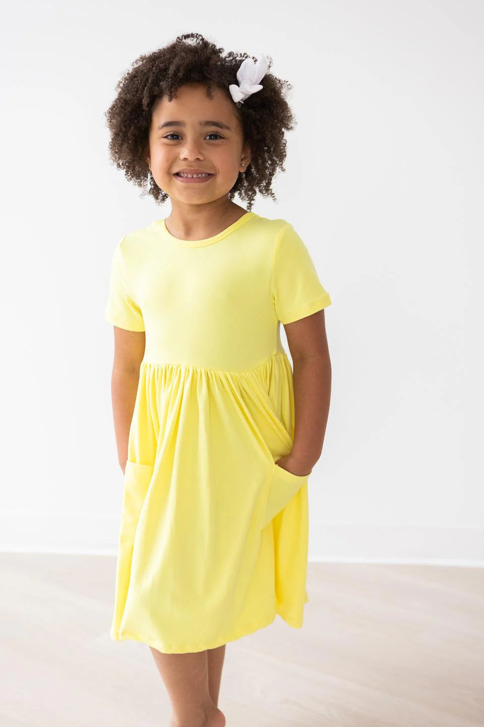 Yellow Pocket Twirl Dress by Mila & Rose