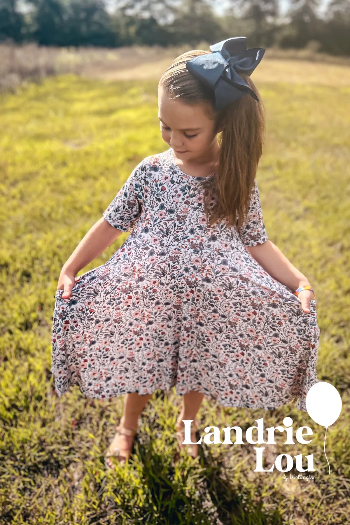 Muted Floral Twirl Dress by Landrie Lou