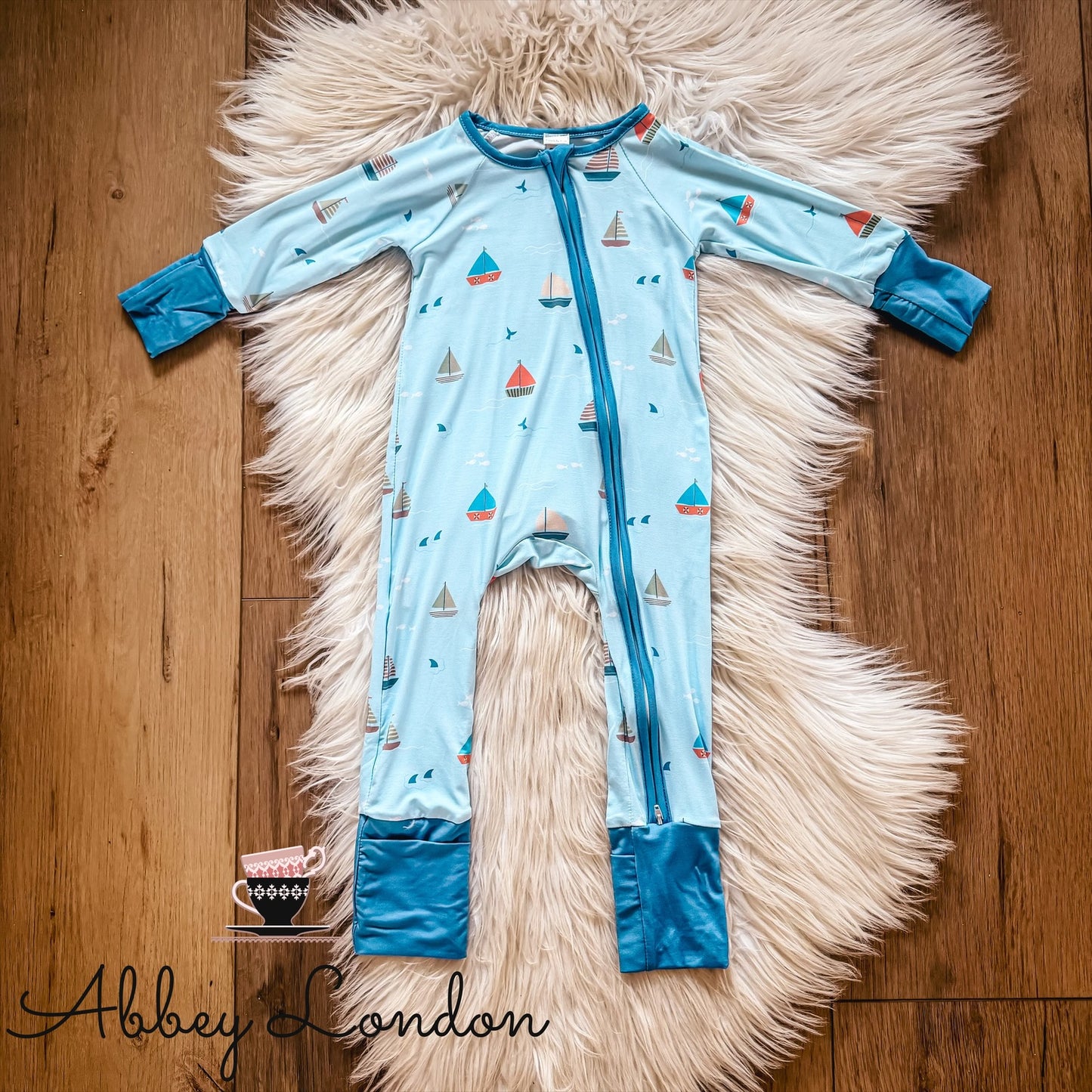 Sailboat Blue Zip & Play Romper by Landrie Lou