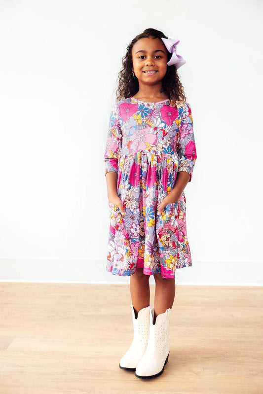 Girl wearing mauve floral dress