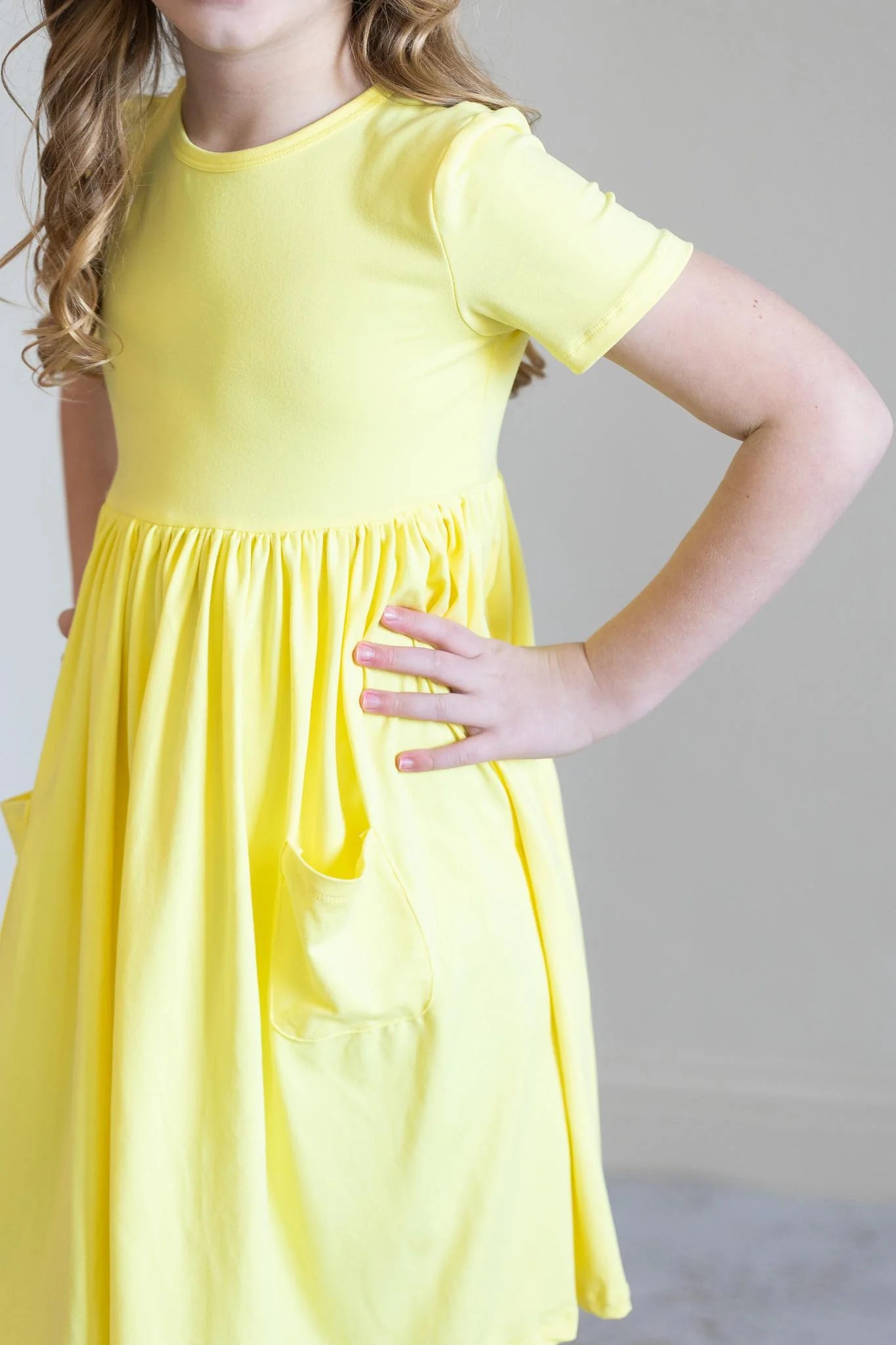 Yellow Pocket Twirl Dress by Mila & Rose