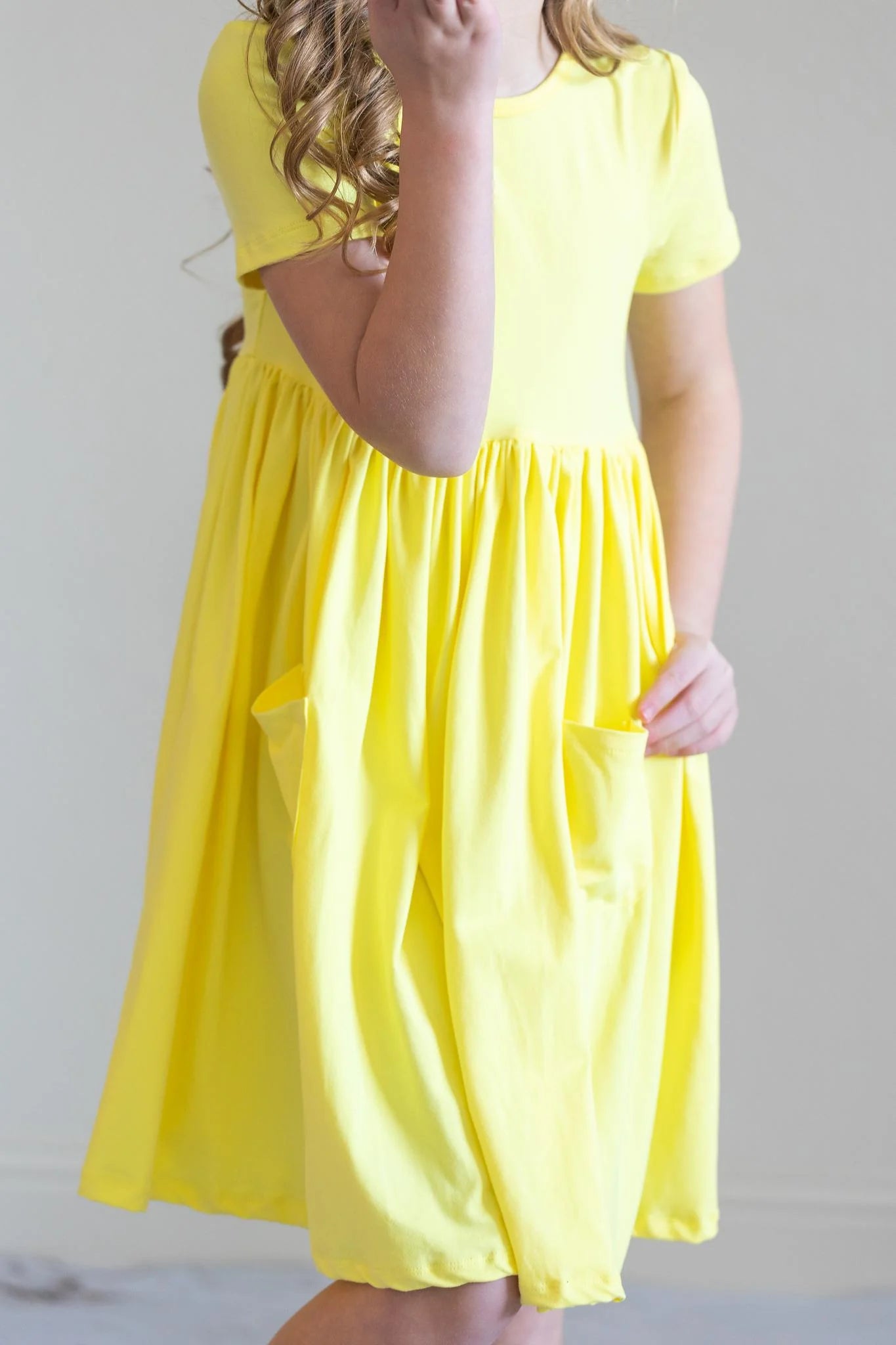 Yellow Pocket Twirl Dress by Mila & Rose