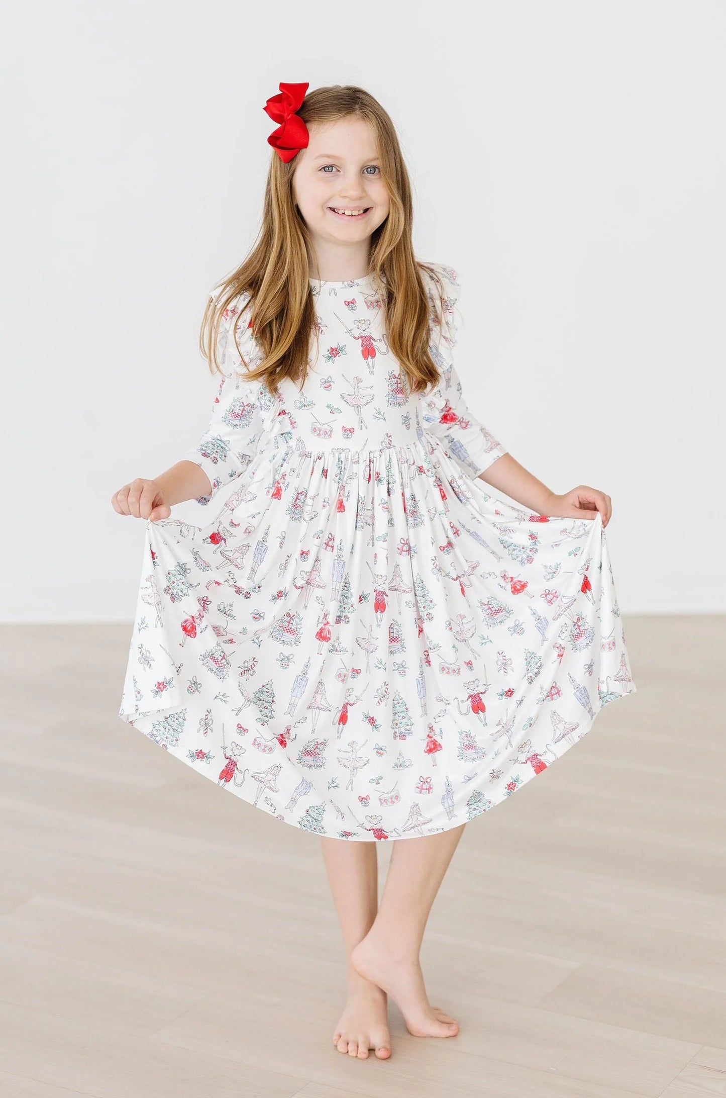 Clara’s Christmas Ruffle Twirl Dress by Mila & Rose