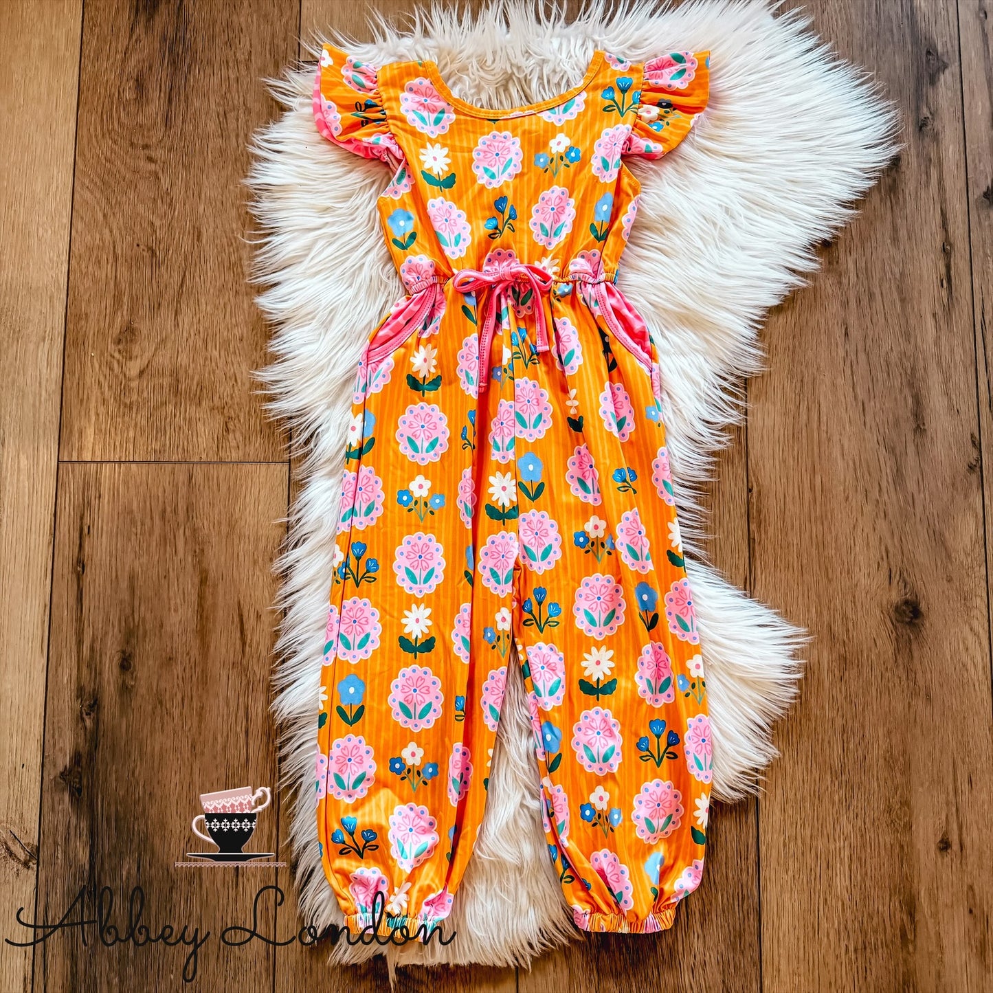 Mustard Flower Portraits Jumpsuit by TwoCan