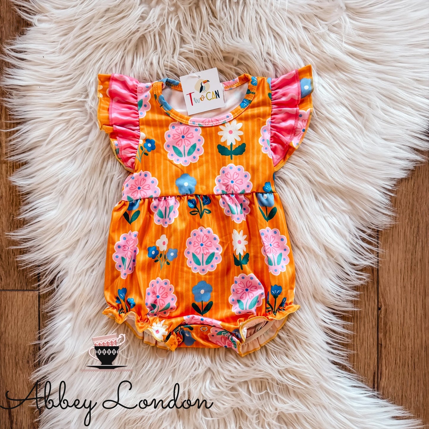 Mustard Flower Portraits Infant Onesie by TwoCan
