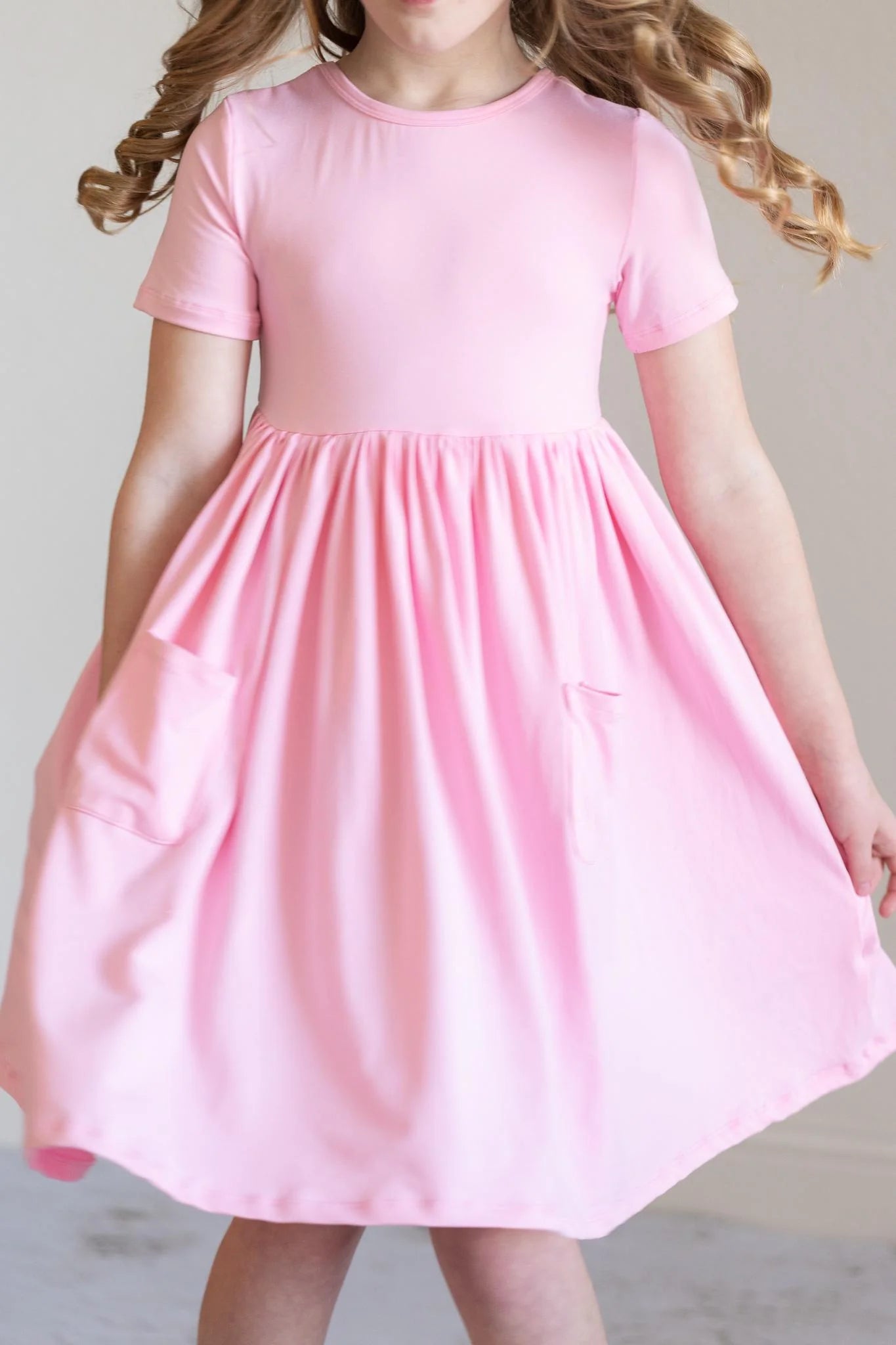 Bubblegum Pink Pocket Twirl Dress by Mila & Rose
