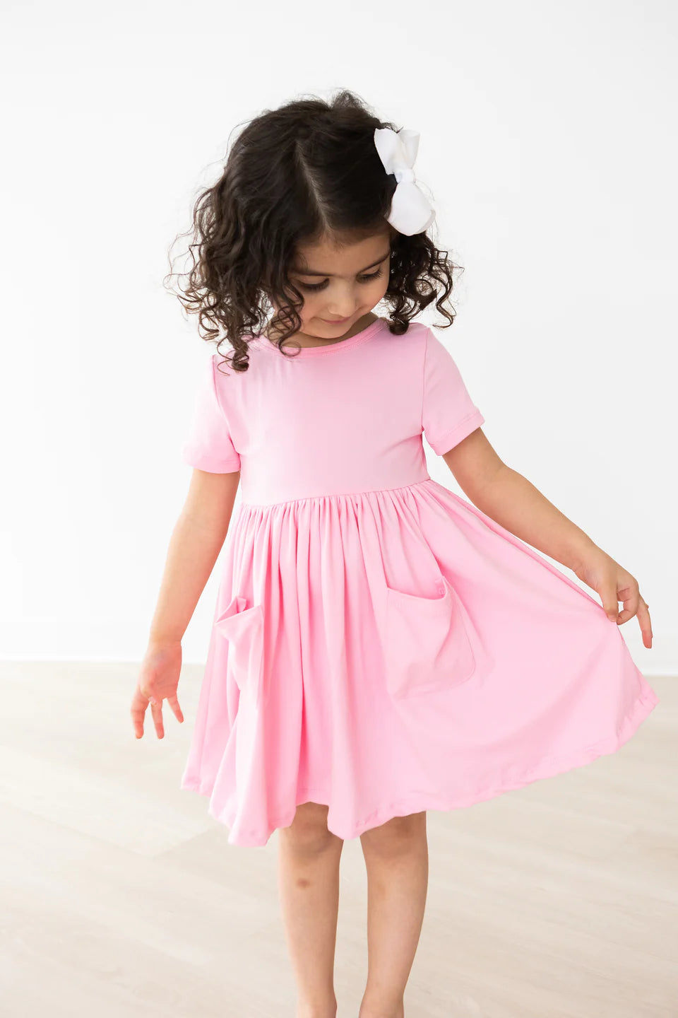 Bubblegum Pink Pocket Twirl Dress by Mila & Rose